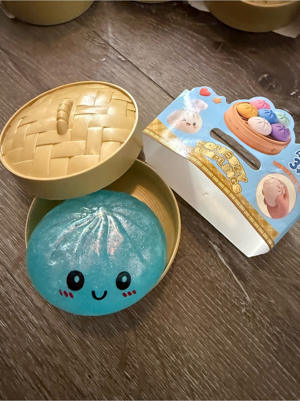 New blue squishy, steamed dumpling, fidget toy in case